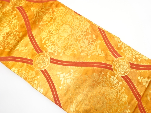 未使用品　立涌に華紋織り出し　名古屋帯